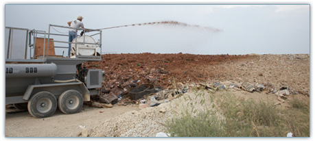 Spraying TOPCOAT Landfill Cover